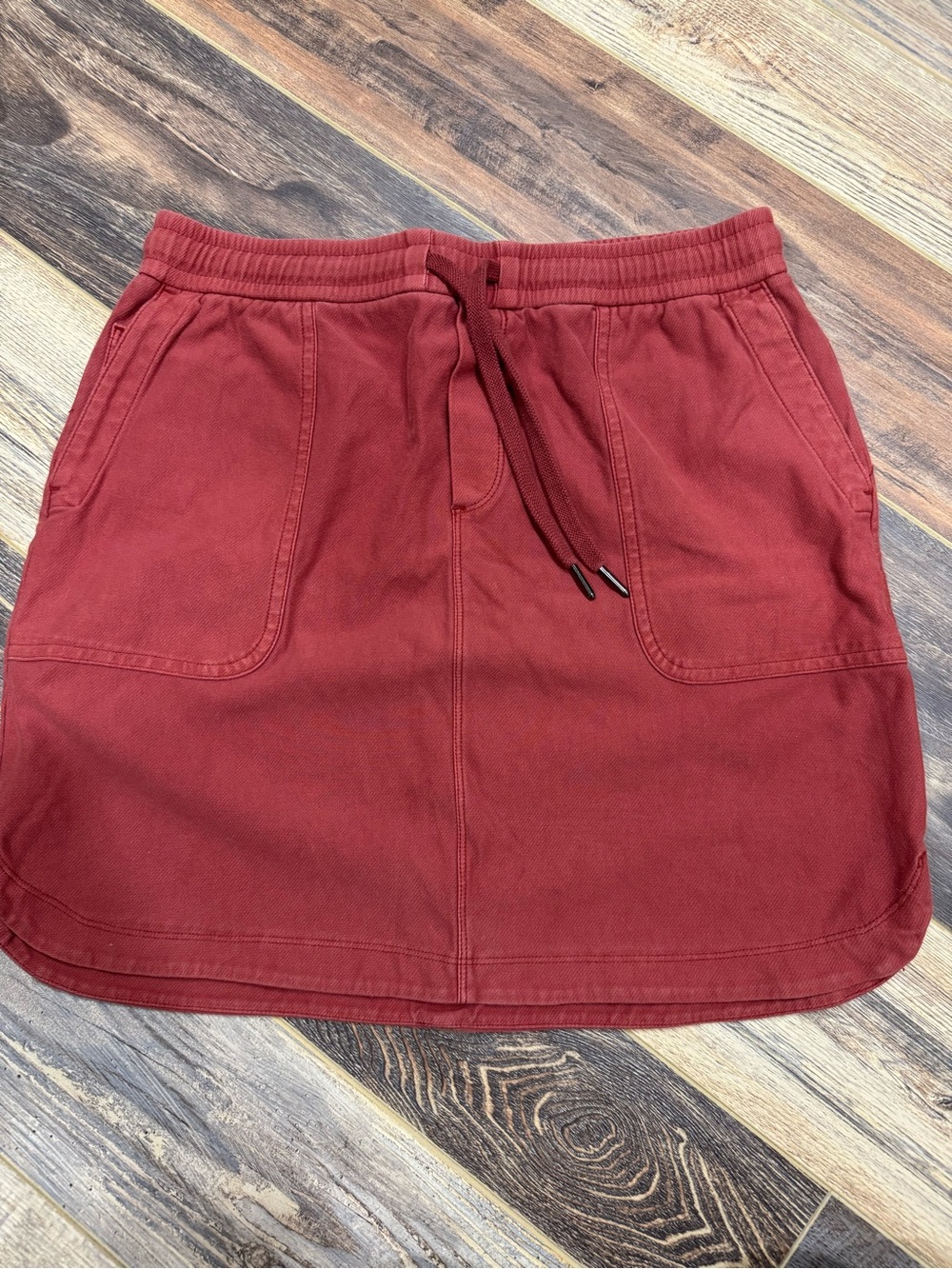 Athleta Brick Red Drawstring Pocket Mini Skirt